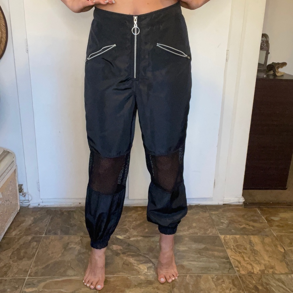 Fishnet track pants with front zipper